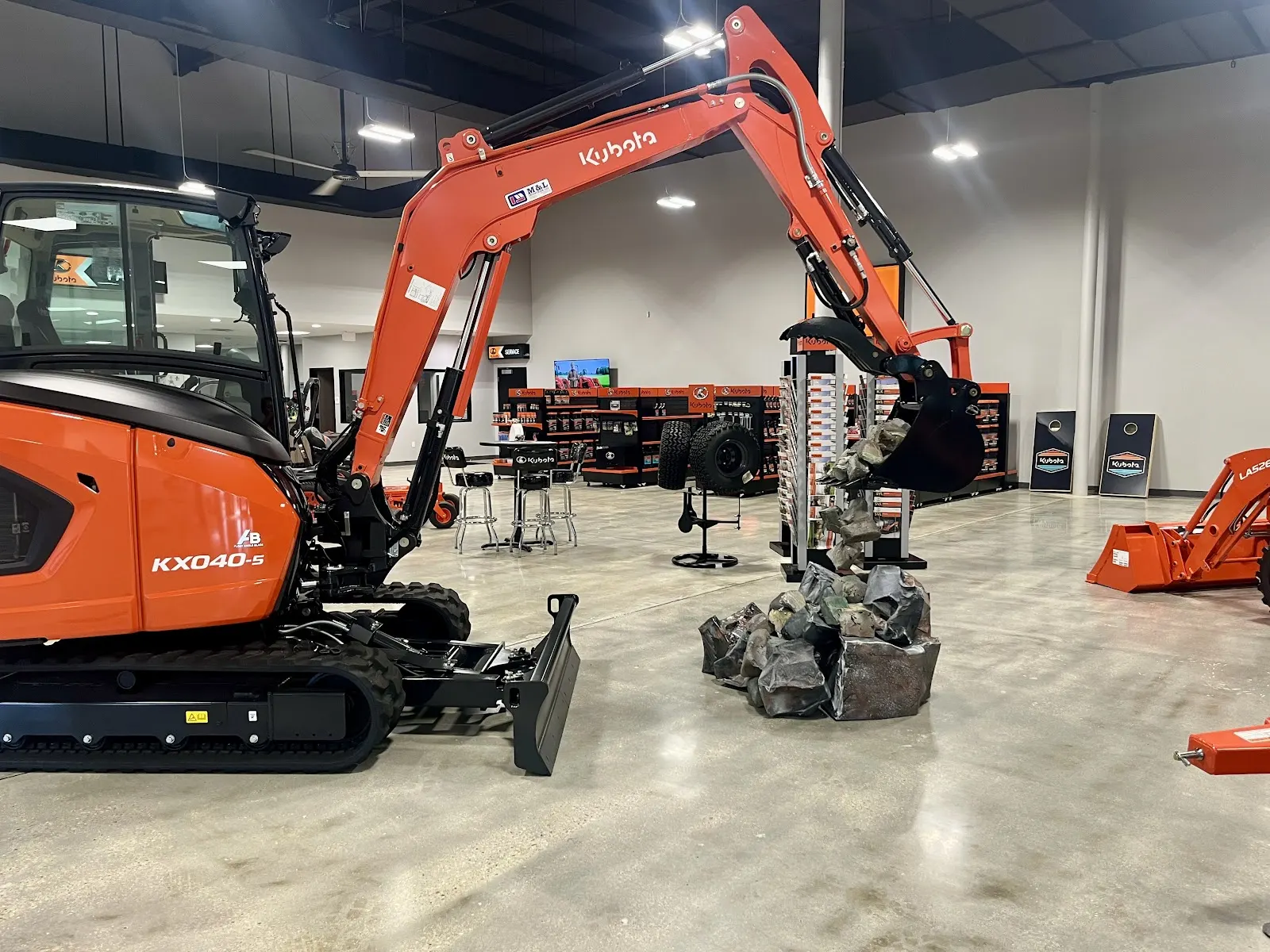 Kubota KX040-5 compact excavator in the M&L Industries showroom